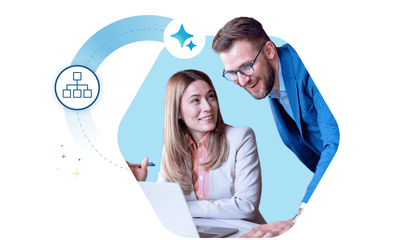 Two recruitment professionals collaborating over a laptop with an organizational chart icon, demonstrating the workflow of an ATS/CRM for staffing agencies.